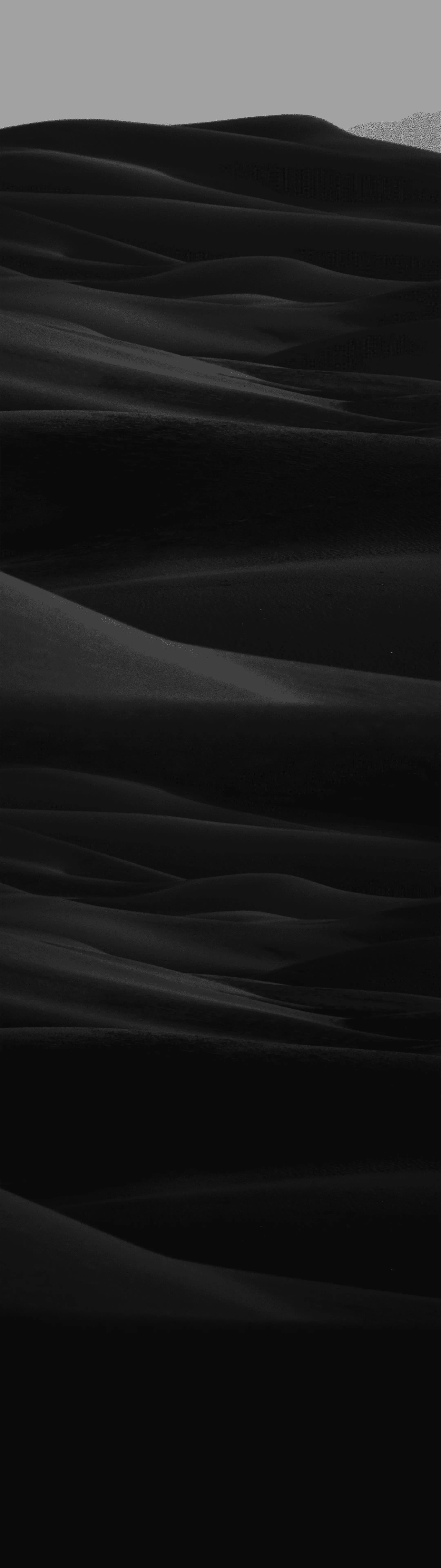 Website Background: A monotone image of a mountain range